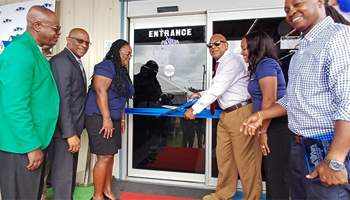 Black Family and Officials At Third Dimension Reopening